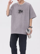 T-Shirt mit gotischer Monogramm-Stickerei